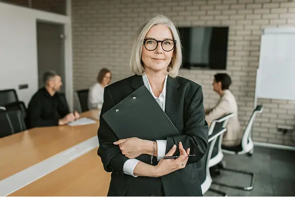 Woman in a businesss meeting looking confident
